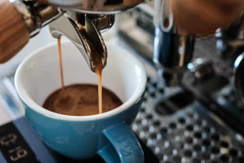 An espresso being poured