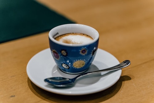 Macchiato, an espresso with a dash of steamed milk.