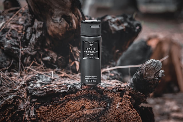 David Beckham's Instinct Deodorant pictured outside in a forest. Photo by Ali Bakhtiari.
