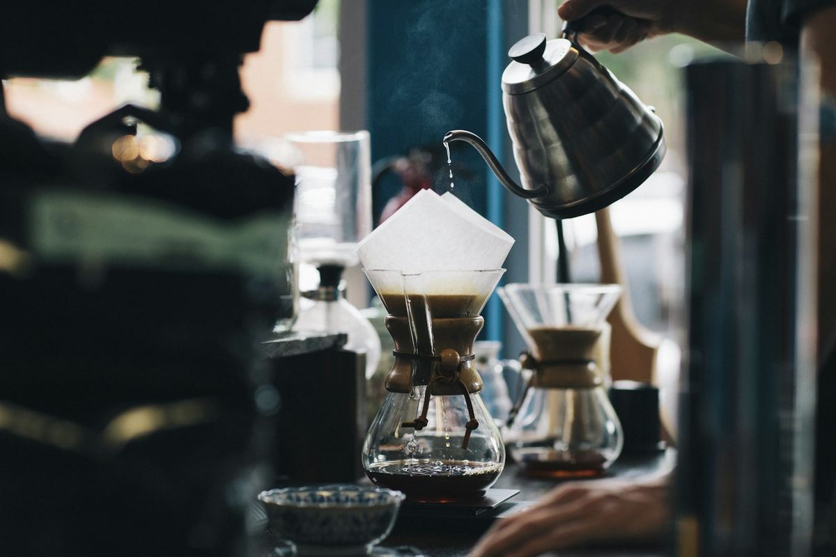 Pour over coffee brewing into a decanter. Photo by Karl Fredrickson on Unsplash.