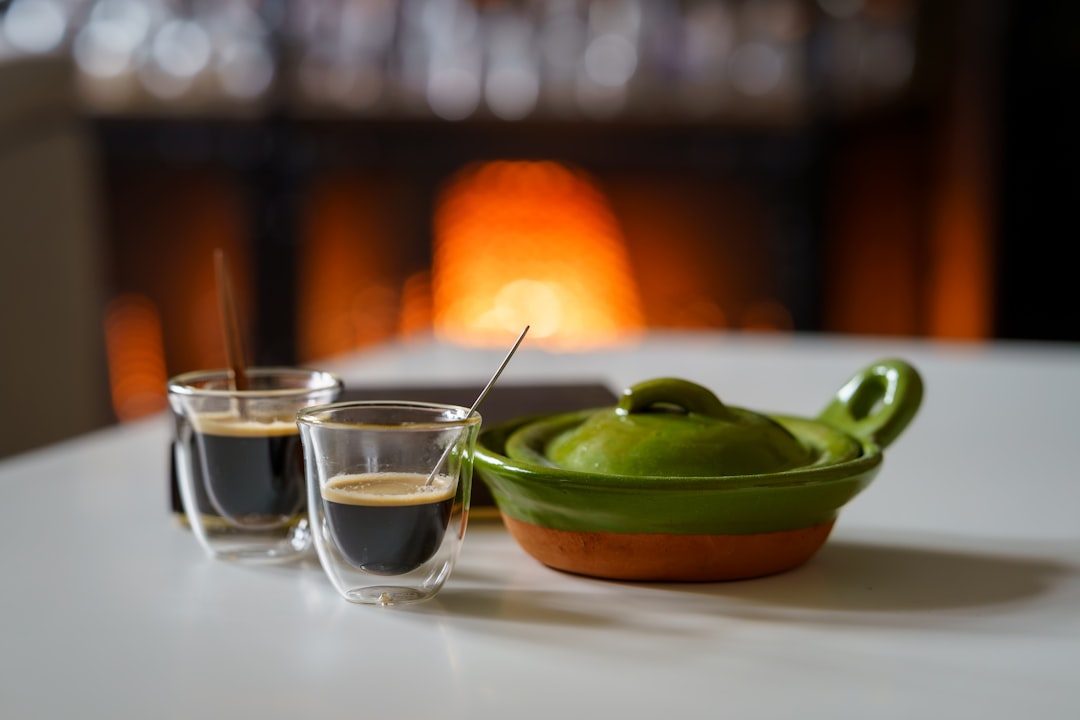 Espresso being pulled into two glasses