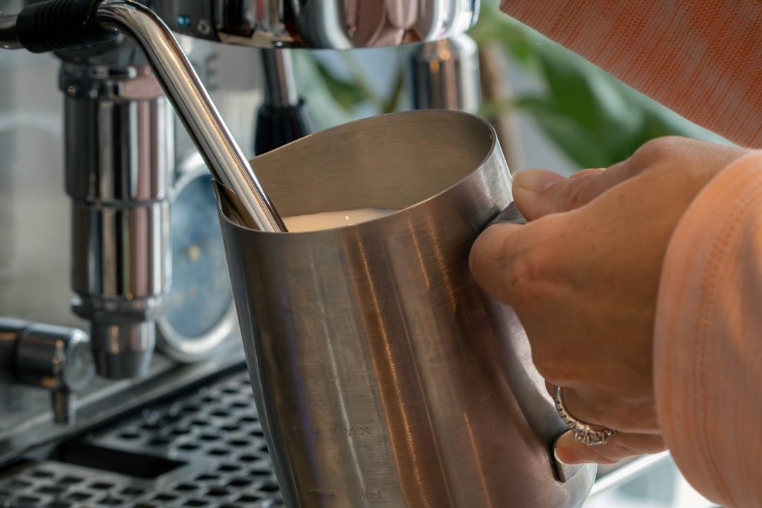 Steaming milk with an espresso machine steam wand