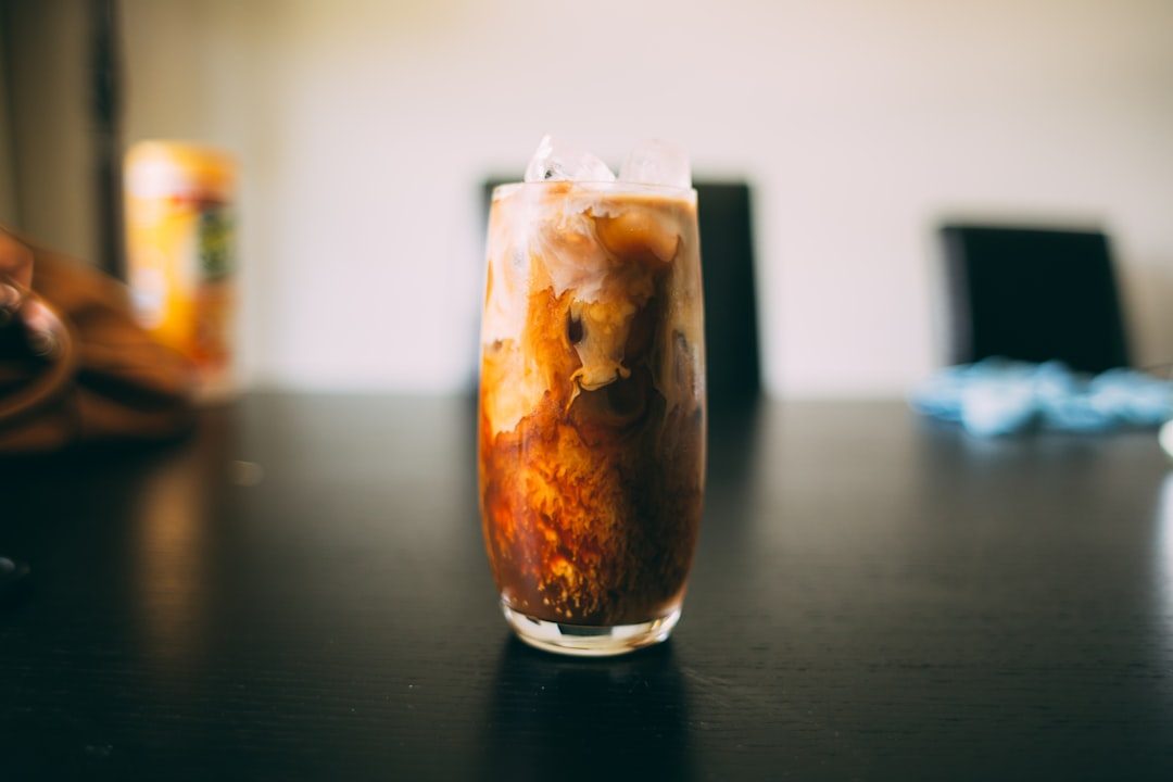 Iced chai latte in a clear glass